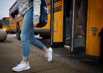  girl exiting bus